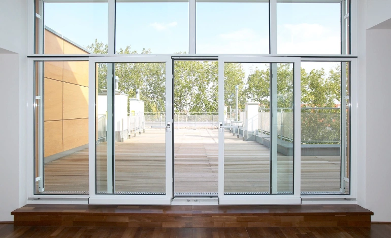 Elegant white door with windows and curtains that complement the space's interior design.